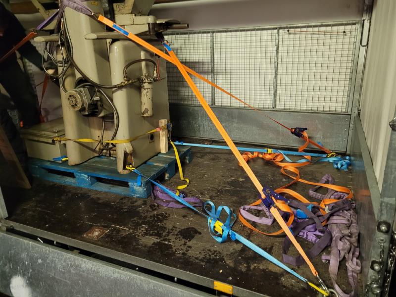 Tripet MHP 500 secured on a three-axle trailer