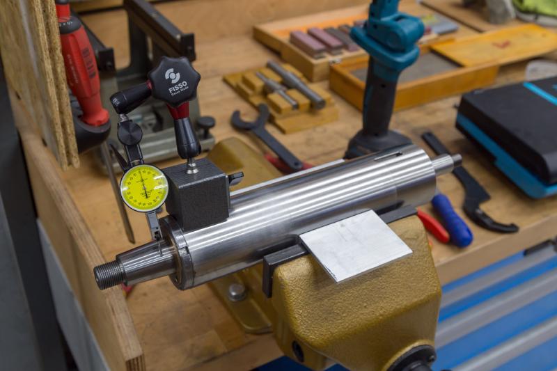 Spindle cartridge on the bench with dial indicator